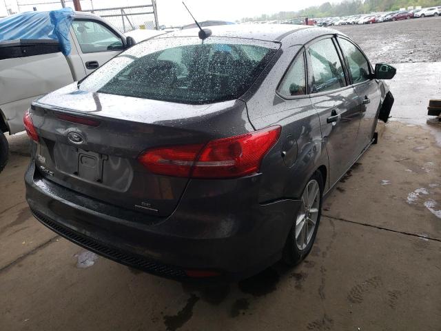 Photo 4 from auction – 2015 FORD FOCUS SE with VIN 1FADP3F21FL243451