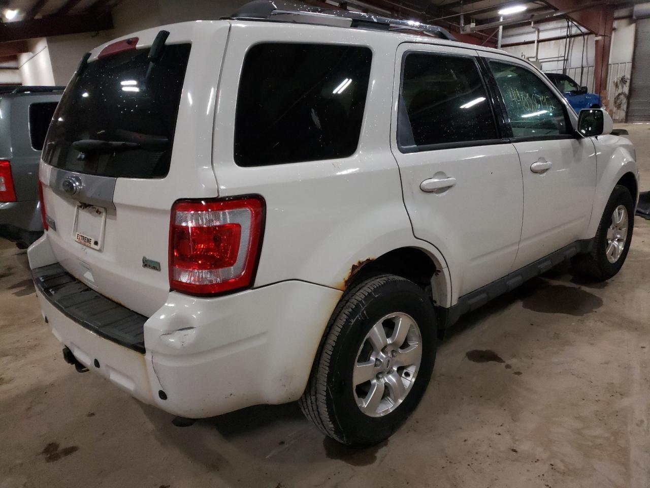 Photo 4 from auction – 2010 FORD ESCAPE LIM with VIN 1FMCU9EG1AKB29863