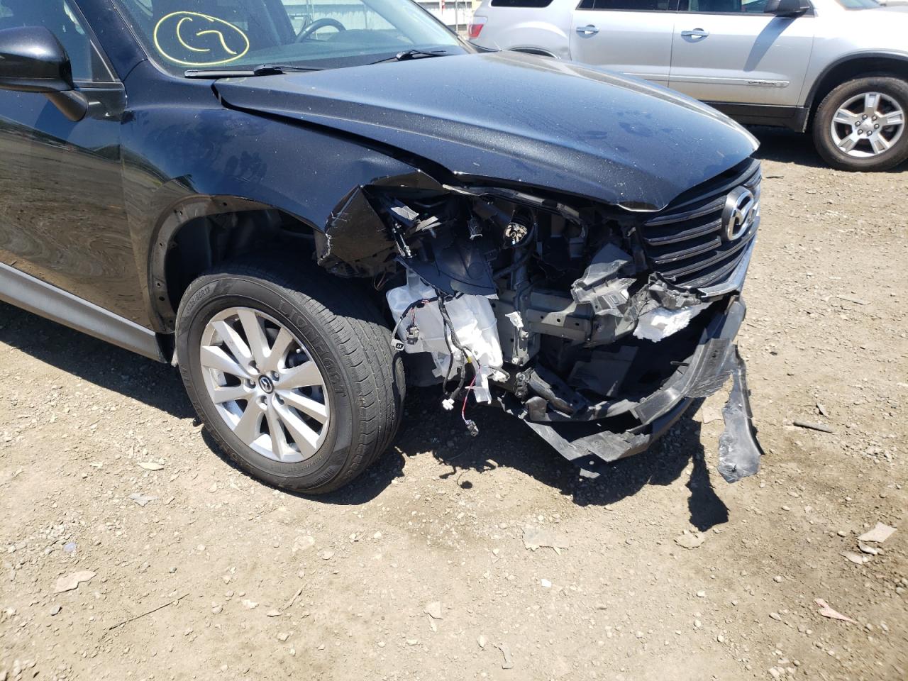 Photo 9 from auction – 2016 MAZDA CX-5 TOURI with VIN JM3KE2CYXG0664976