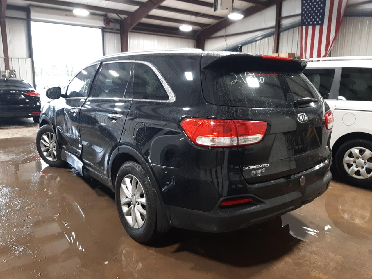 Photo 3 from auction – 2016 KIA SORENTO LX with VIN 5XYPGDA36GG052196