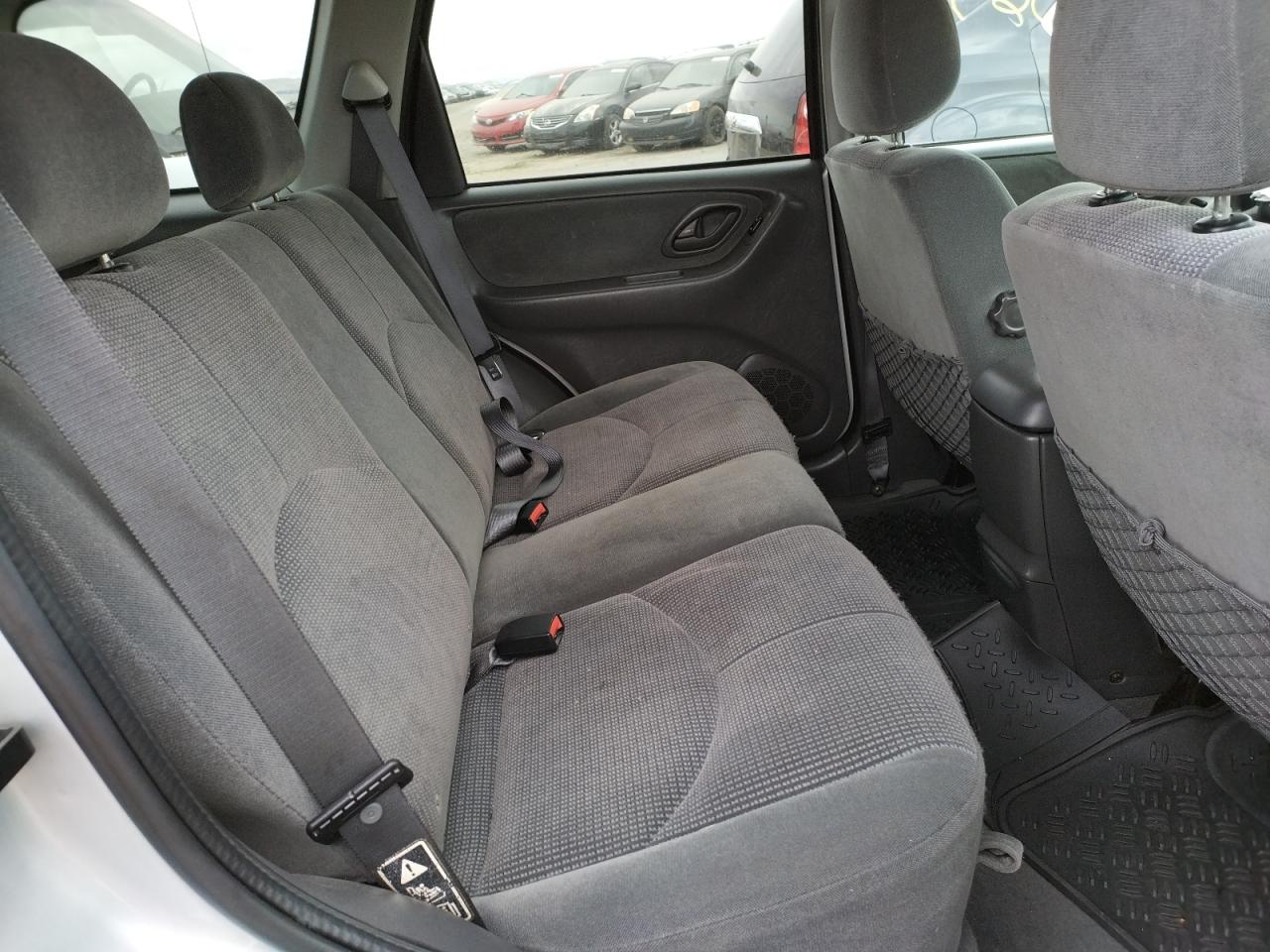 Photo 6 from auction – 2003 MAZDA TRIBUTE LX with VIN 4F2YZ04123KM54934