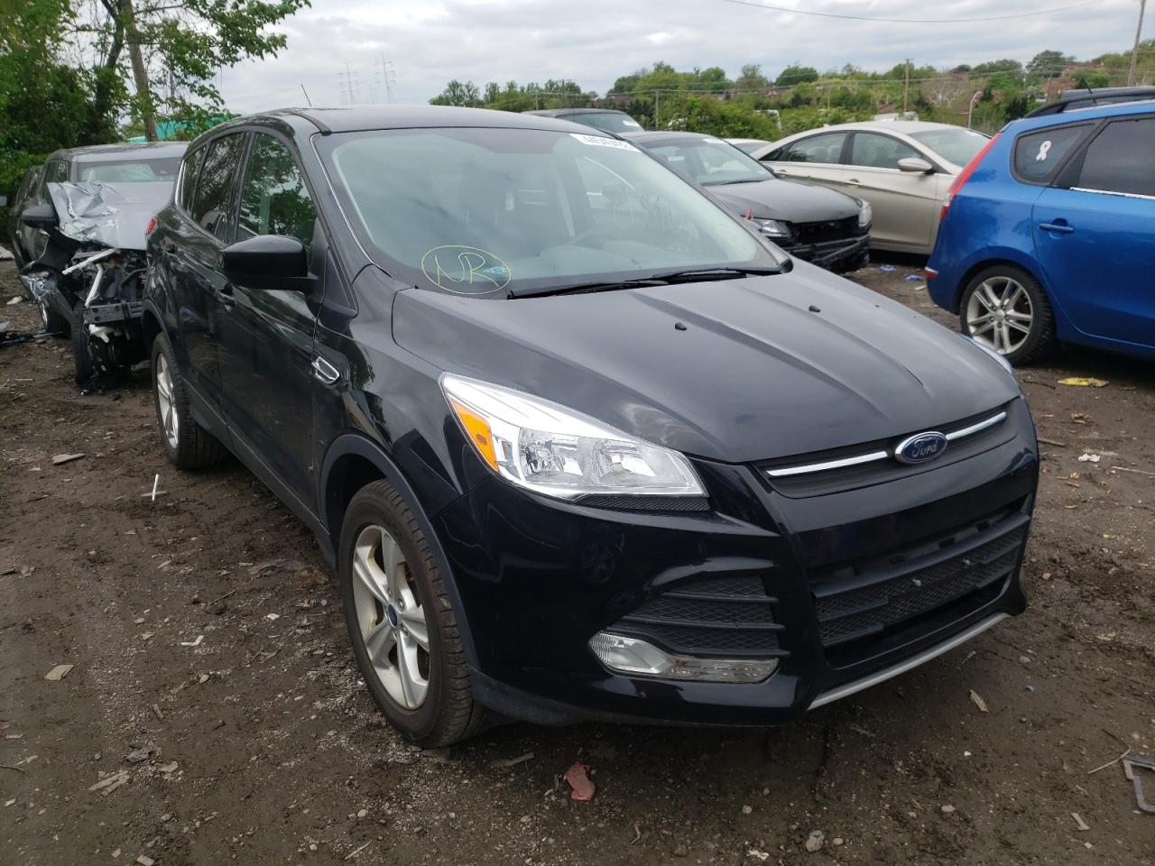 FORD ESCAPE SE 2016 with VIN 1FMCU9GX1GUC06516 - Photo from auction