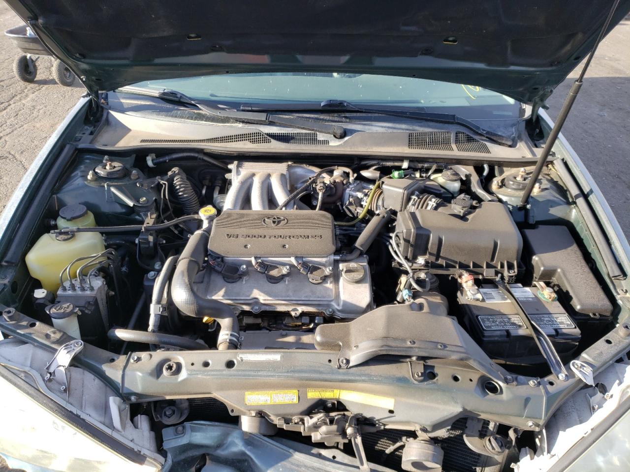 Photo 7 from auction – 2002 TOYOTA CAMRY LE with VIN JTDBF30K820009655
