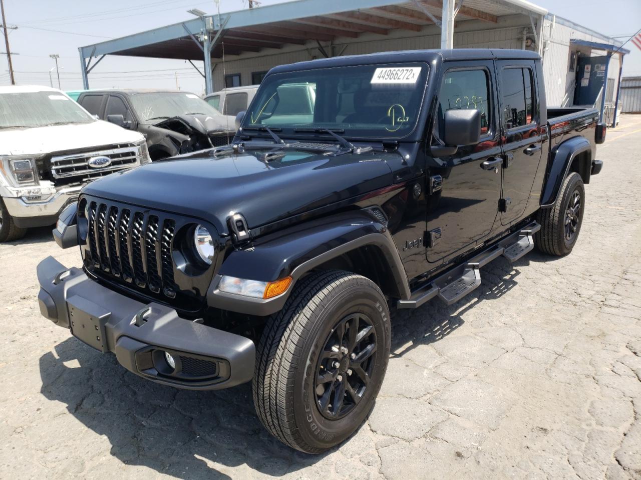 Photo 2 from auction – 2021 JEEP GLADIATOR with VIN 1C6HJTAG1ML612216