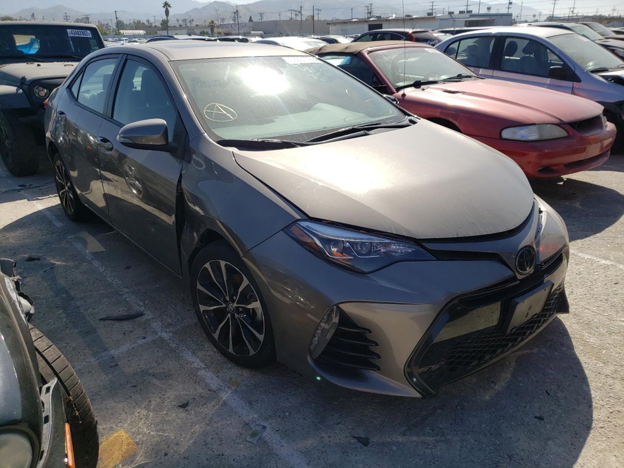 TOYOTA COROLLA L 2019 with VIN 2T1BURHE1KC132209 - Photo from auction
