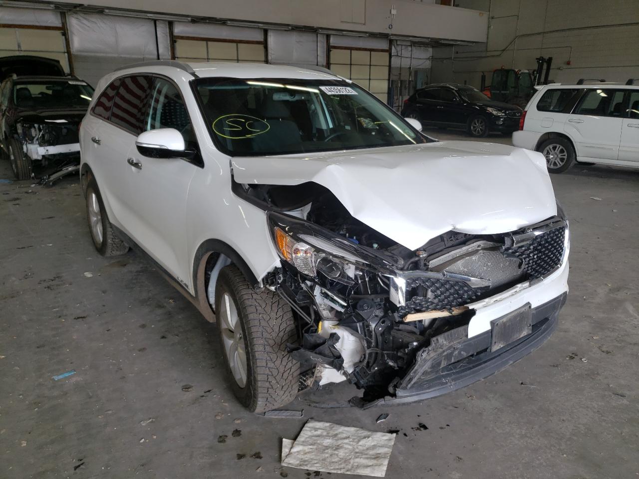 KIA SORENTO LX 2018 with VIN 5XYPGDA59JG371553 - Photo from auction