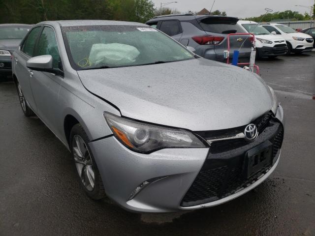 TOYOTA CAMRY LE 2017 with VIN 4T1BF1FK2HU671627 - Photo from auction
