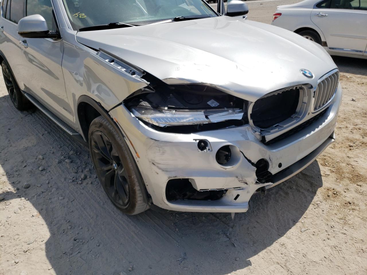 Photo 9 from auction – 2016 BMW X5 XDRIVE5 with VIN 5UXKR6C54G0J83422