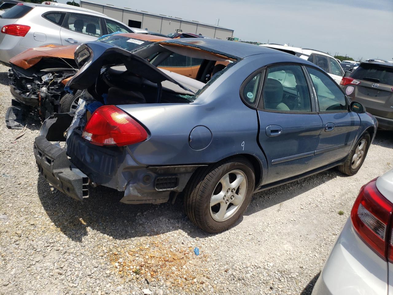 Photo 4 from auction – 2000 FORD TAURUS SES with VIN 1FAFP5522YG144462