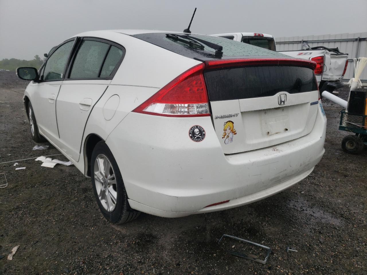 Photo 3 from auction – 2011 HONDA INSIGHT EX with VIN JHMZE2H79BS007086