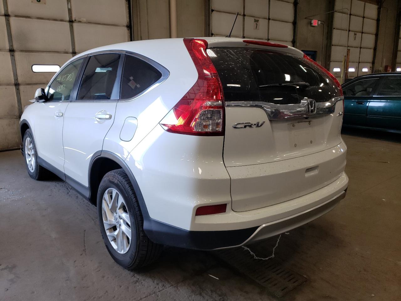 Photo 3 from auction – 2016 HONDA CR-V with VIN 5J6RM4H57GL125776