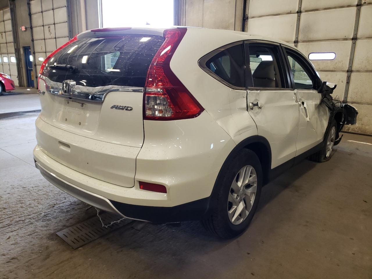 Photo 4 from auction – 2016 HONDA CR-V with VIN 5J6RM4H57GL125776