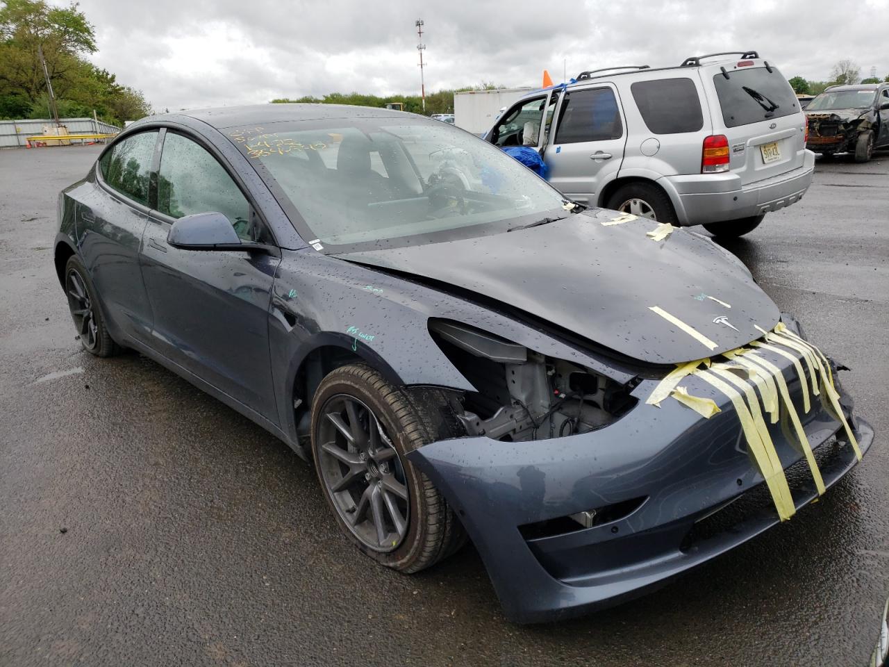 TESLA MODEL 3 2021 with VIN 5YJ3E1EA5MF086001 - Photo from auction