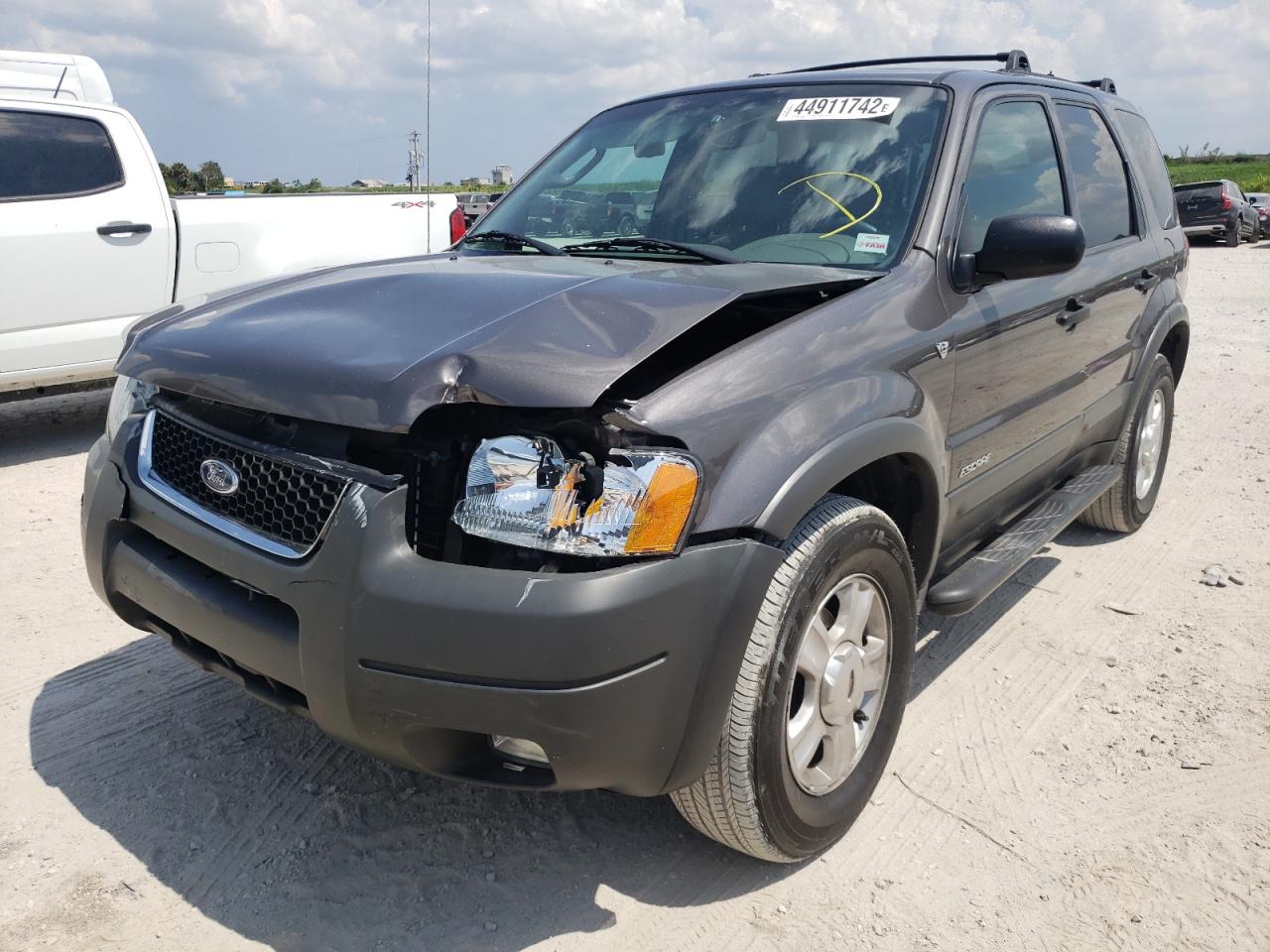 Photo 2 from auction – 2002 FORD ESCAPE XLT with VIN 1FMYU04112KD82195