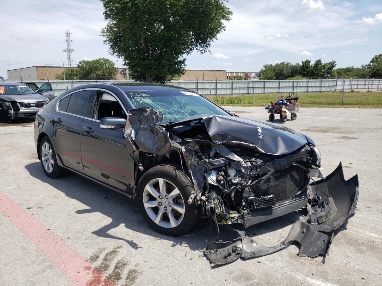 ACURA TL 2012 with VIN 19UUA8F58CA028127 - Photo from auction