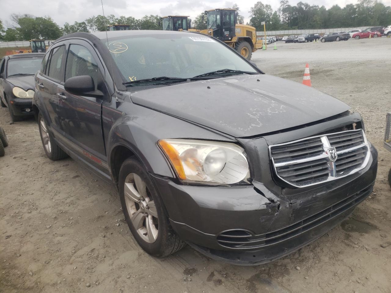 DODGE CALIBER MA 2011 with VIN 1B3CB3HA5BD215019 - Photo from auction