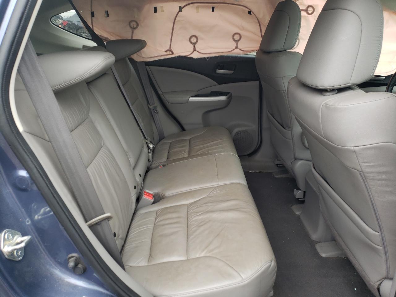 Photo 6 from auction – 2013 HONDA CRV with VIN 2HKRM3H79DH513190