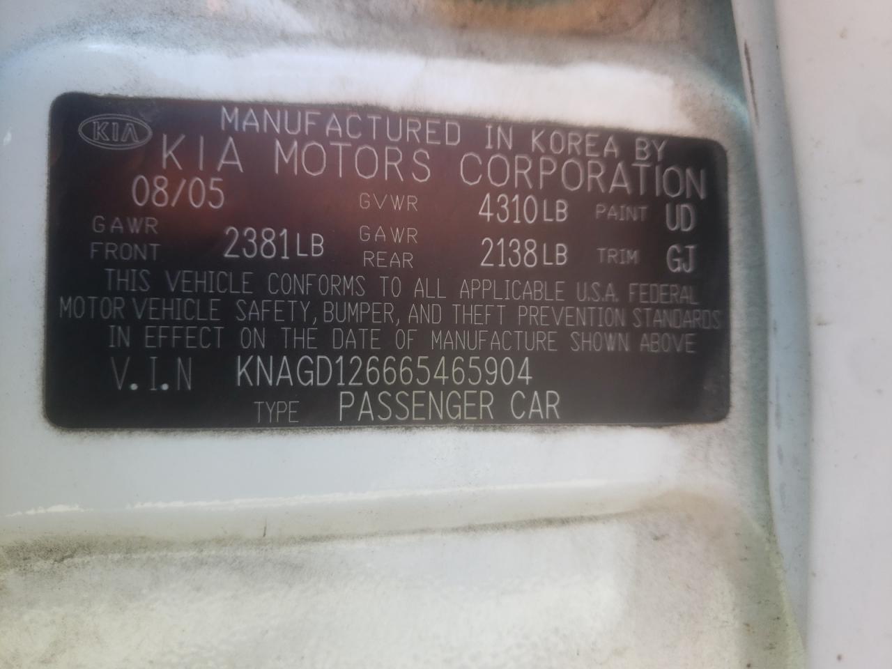 Photo 10 from auction – 2006 KIA OPTIMA LX with VIN KNAGD126665465904