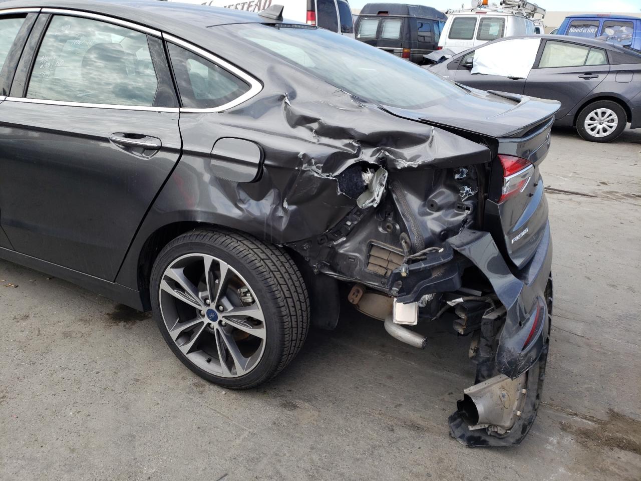 Photo 9 from auction – 2019 FORD FUSION TIT with VIN 3FA6P0D98KR256815
