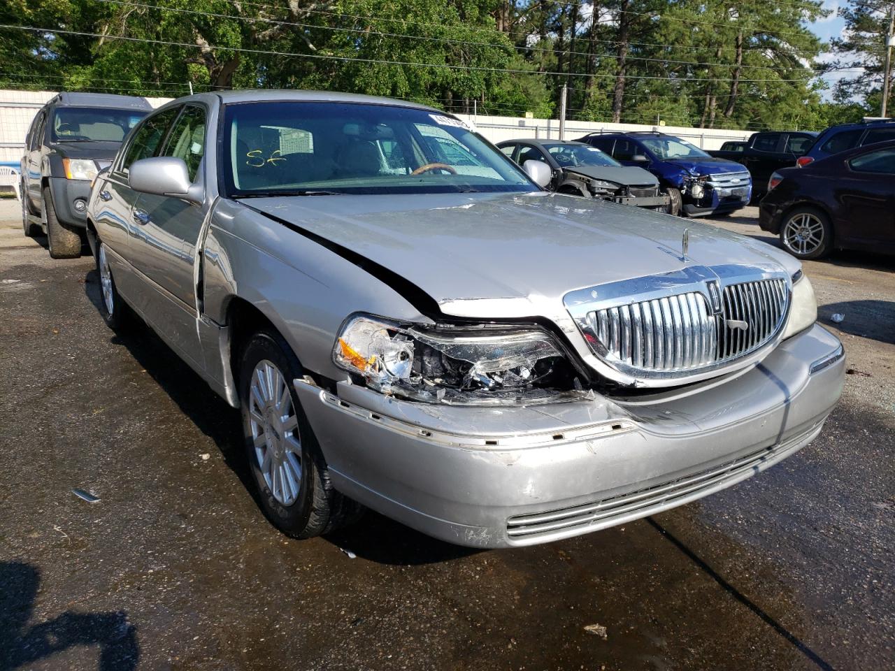 Photo 1 from auction – 2004 LINCOLN TOWN CAR U with VIN 1LNHM83W04Y627628