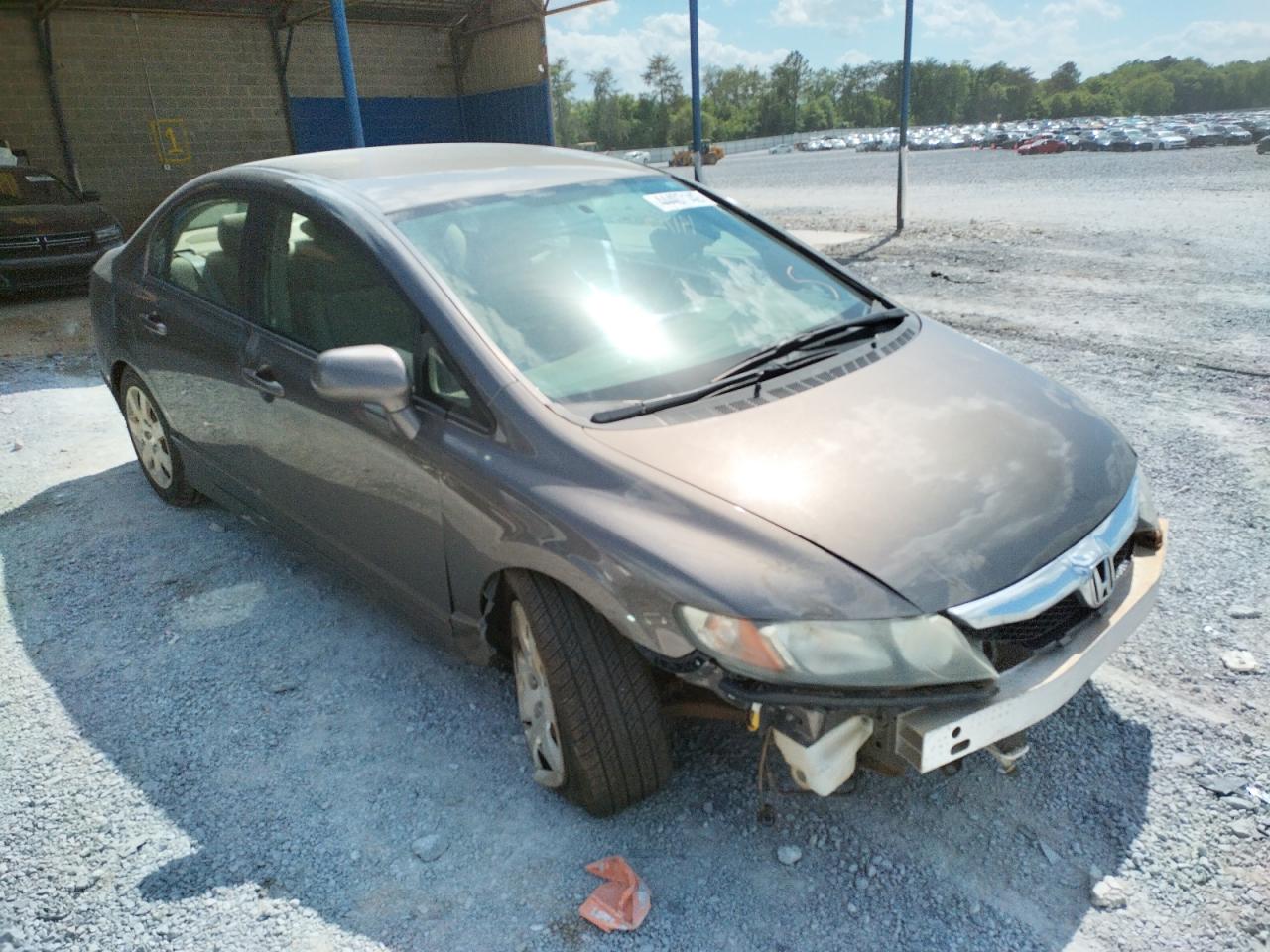 HONDA CIVIC LX 2011 with VIN 19XFA1F56BE048385 - Photo from auction