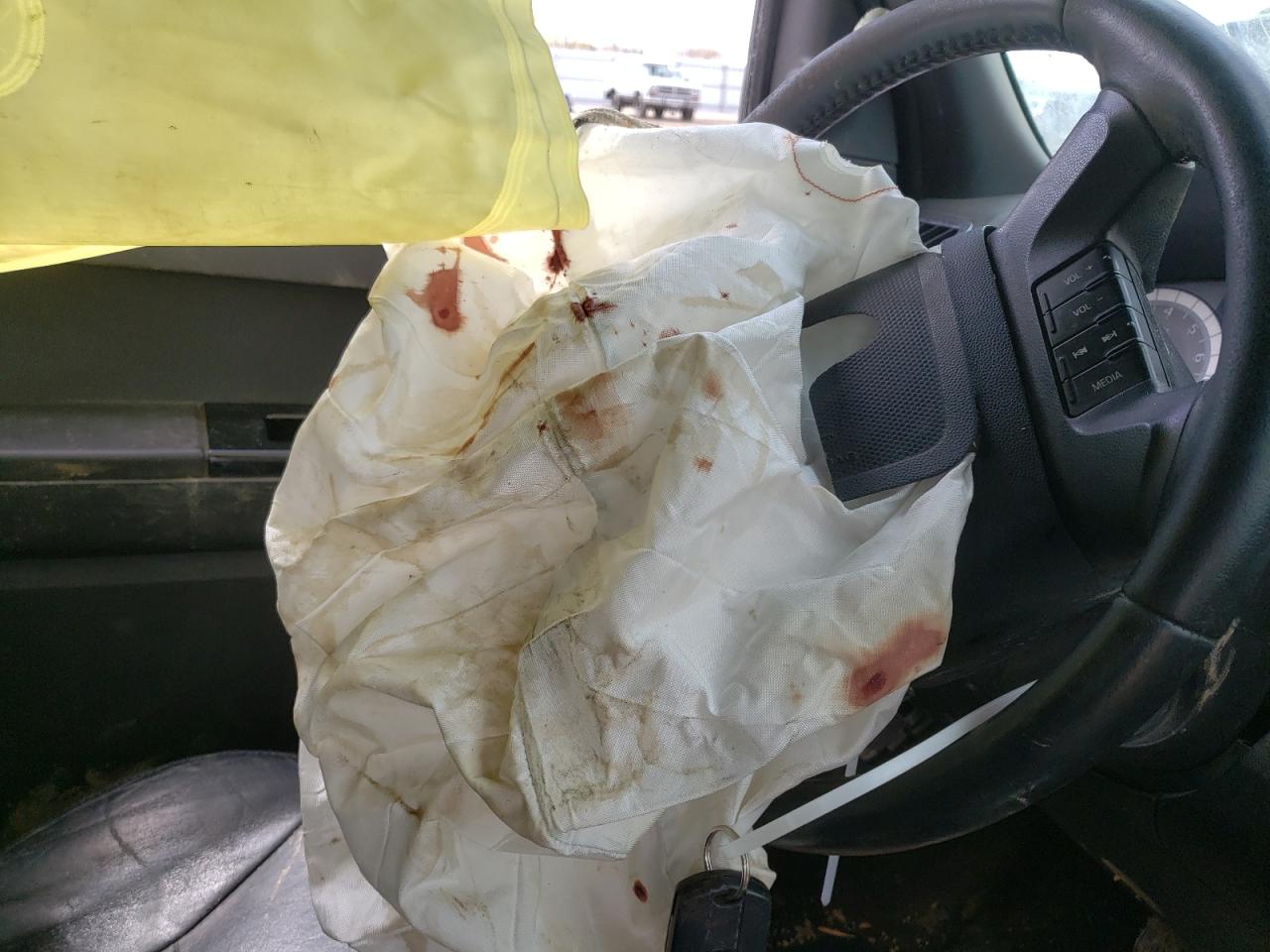 Photo 10 from auction – 2008 FORD ESCAPE LIM with VIN 1FMCU94128KE10562