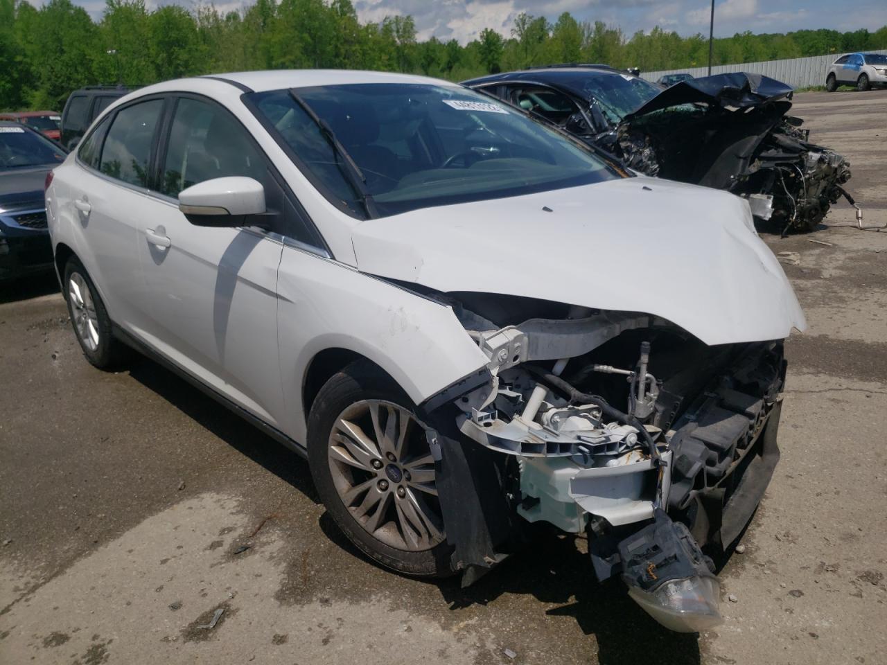 FORD FOCUS SEL 2012 with VIN 1FAHP3H27CL479452 - Photo from auction