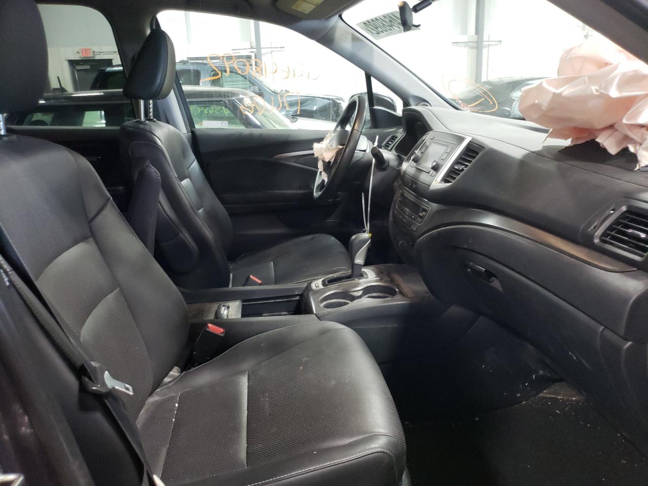 Photo 5 from auction – 2019 HONDA RIDGELINE with VIN 5FPYK3F58KB046852