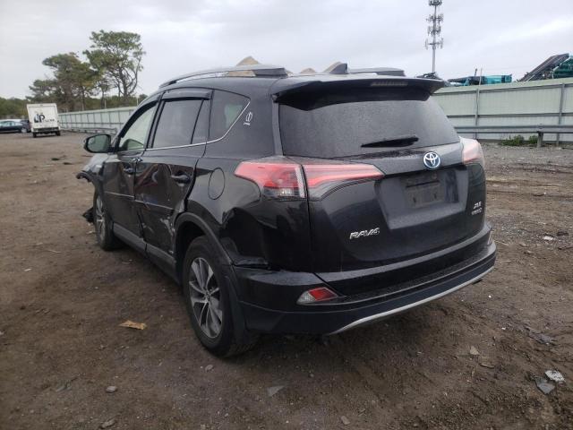 Photo 3 from auction – 2018 TOYOTA RAV4 with VIN JTMRJREV1JD222571