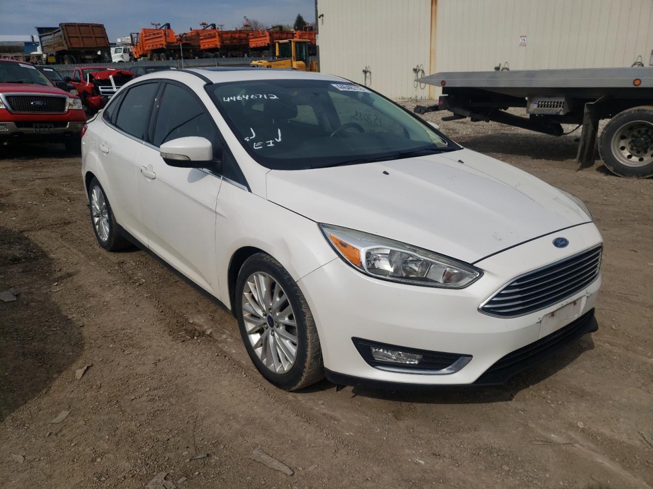 Photo 1 from auction – 2015 FORD FOCUS TITA with VIN 1FADP3J24FL287631