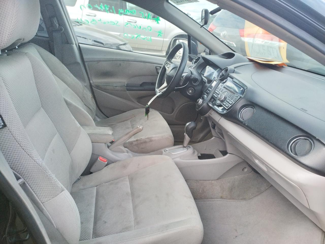 Photo 5 from auction – 2011 HONDA INSIGHT EX with VIN JHMZE2H70BS004609