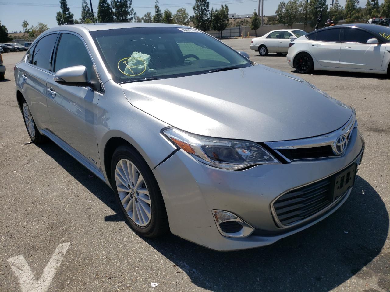 TOYOTA AVALON HYB 2015 with VIN 4T1BD1EB9FU040698 - Photo from auction