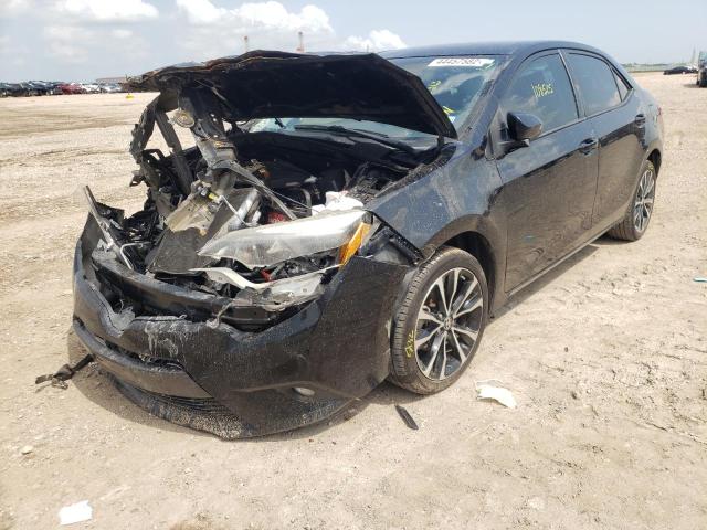 Photo 2 from auction – 2016 TOYOTA COROLLA L with VIN 5YFBURHE0GP512343