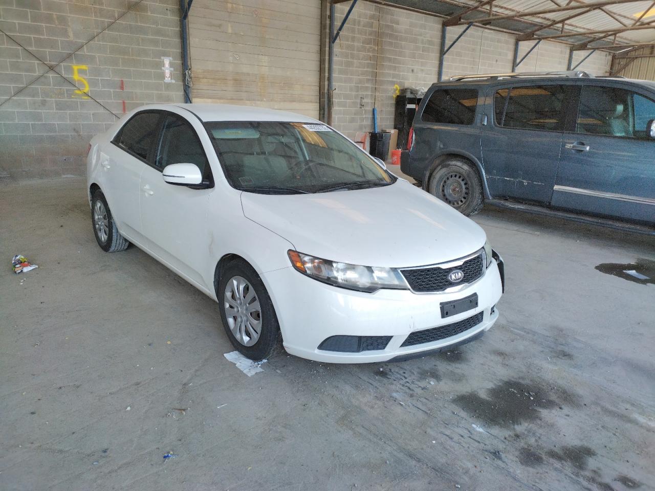 KIA FORTE EX 2012 with VIN KNAFU4A27C5565162 - Photo from auction