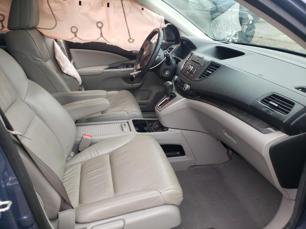 Photo 5 from auction – 2013 HONDA CRV with VIN 2HKRM3H79DH513190