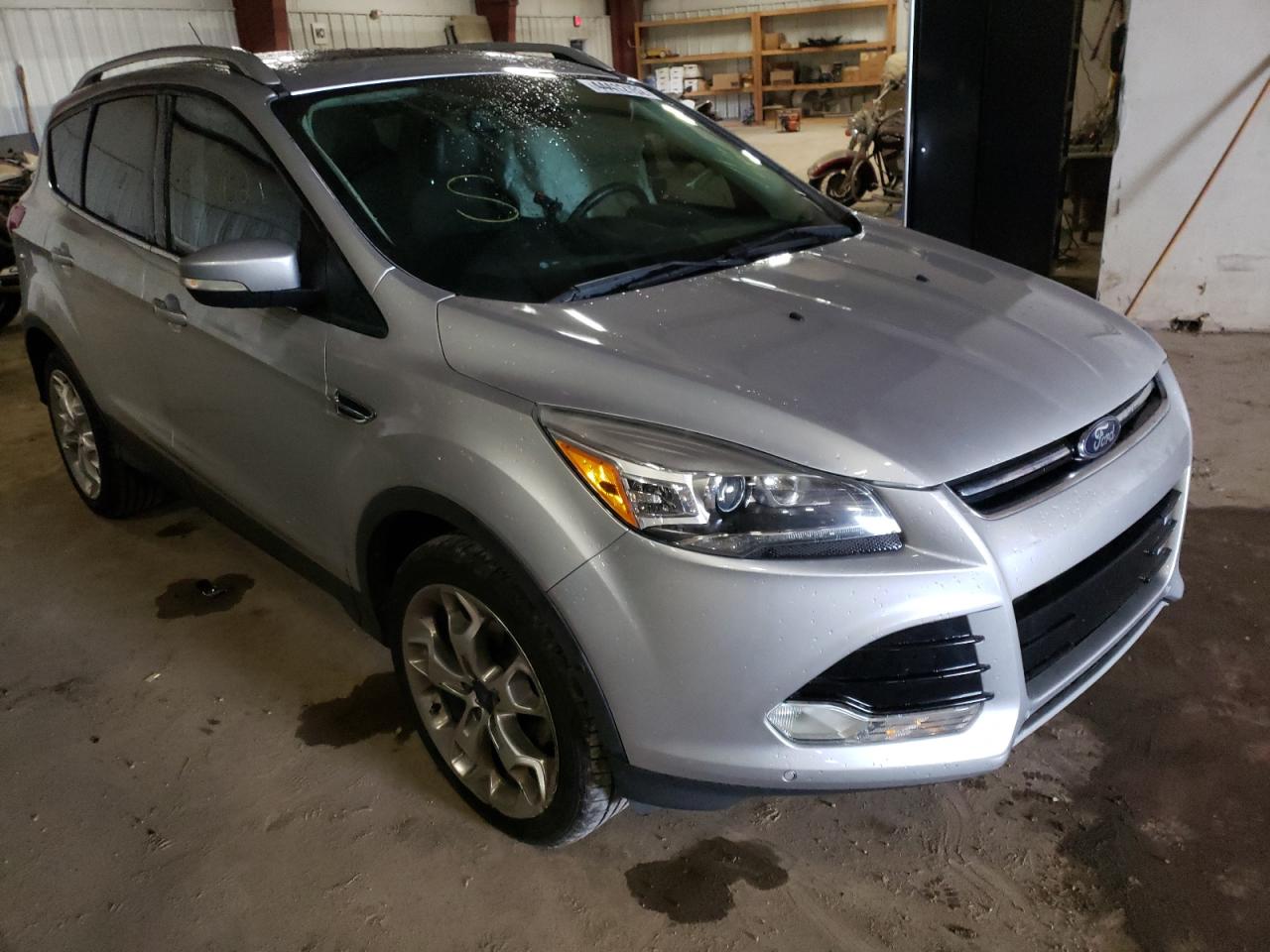 FORD ESCAPE TIT 2014 with VIN 1FMCU0JX8EUB71054 - Photo from auction