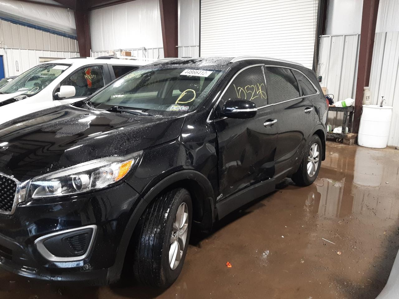 Photo 9 from auction – 2016 KIA SORENTO LX with VIN 5XYPGDA36GG052196