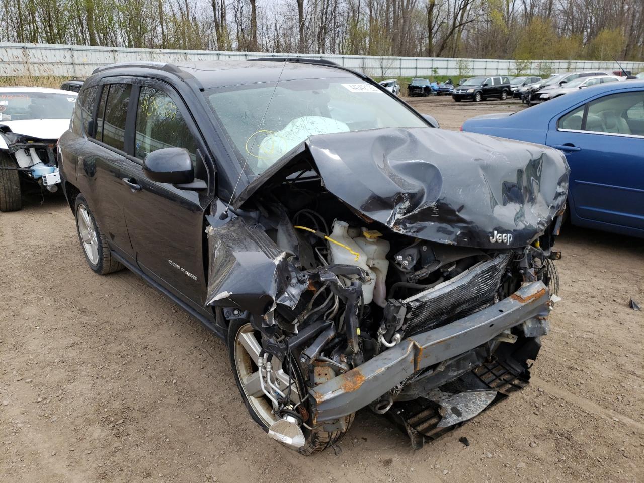 JEEP COMPASS LA 2014 with VIN 1C4NJCEA0ED813814 - Photo from auction