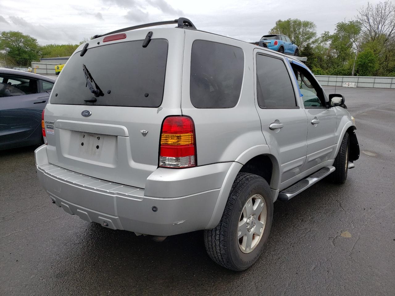 Photo 16 from auction – 2007 FORD ESCAPE LIM with VIN 1FMCU94187KA36036