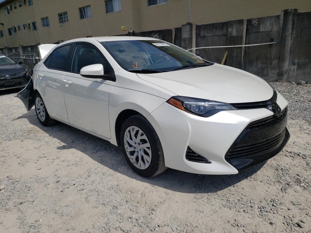 TOYOTA COROLLA L 2019 with VIN 5YFBURHE2KP880645 - Photo from auction