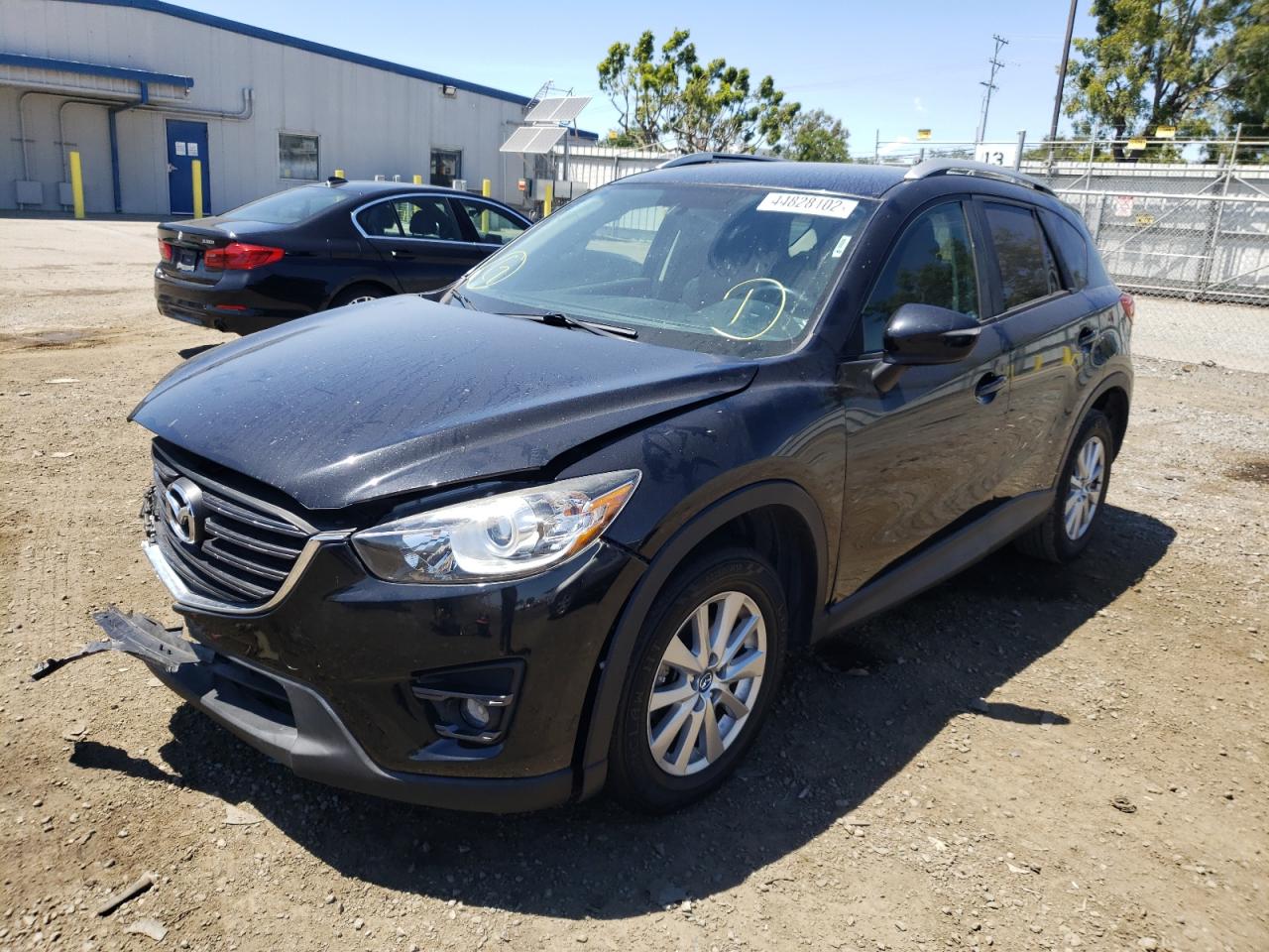 Photo 2 from auction – 2016 MAZDA CX-5 TOURI with VIN JM3KE2CYXG0664976