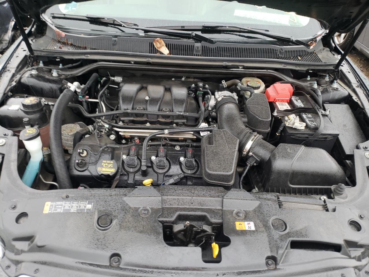 Photo 12 from auction – 2013 FORD TAURUS SEL with VIN 1FAHP2E85DG187764