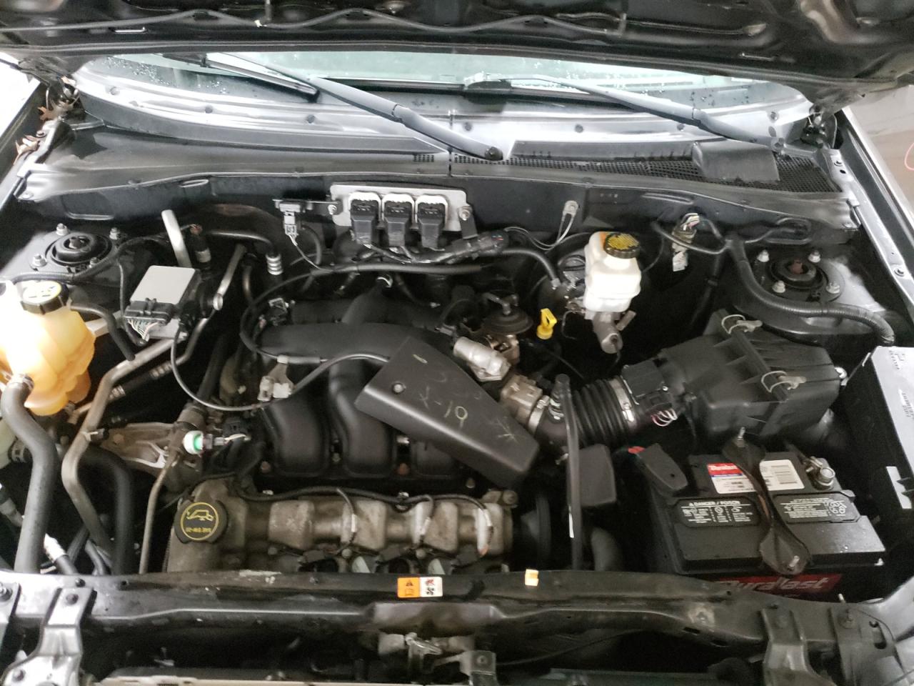 Photo 7 from auction – 2005 FORD ESCAPE LIM with VIN 1FMYU94115KD73621