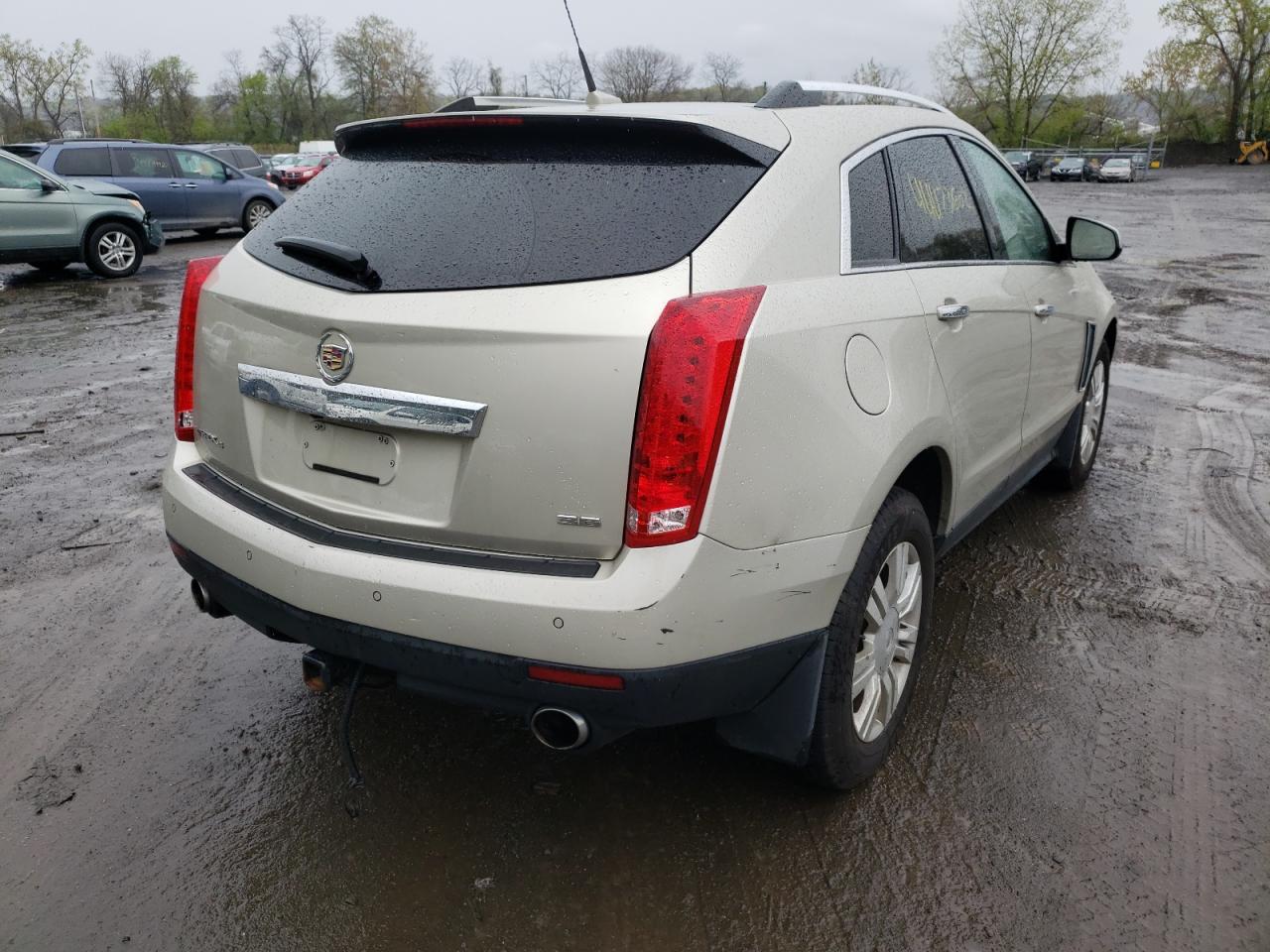 Photo 17 from auction – 2014 CADILLAC SRX LUXURY with VIN 3GYFNEE32ES599117
