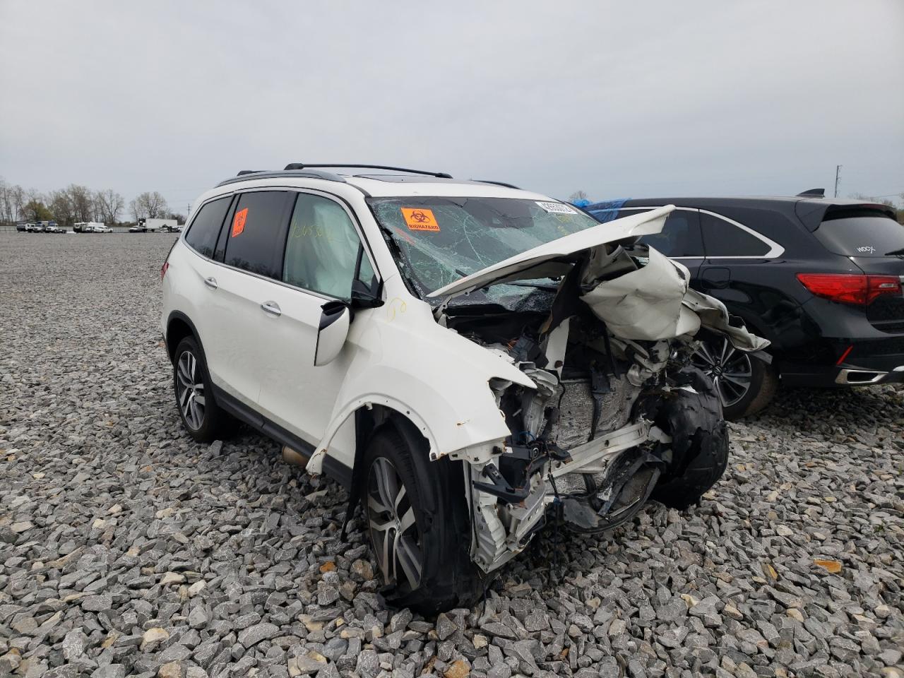 HONDA PILOT ELIT 2017 with VIN 5FNYF6H09HB102807 - Photo from auction