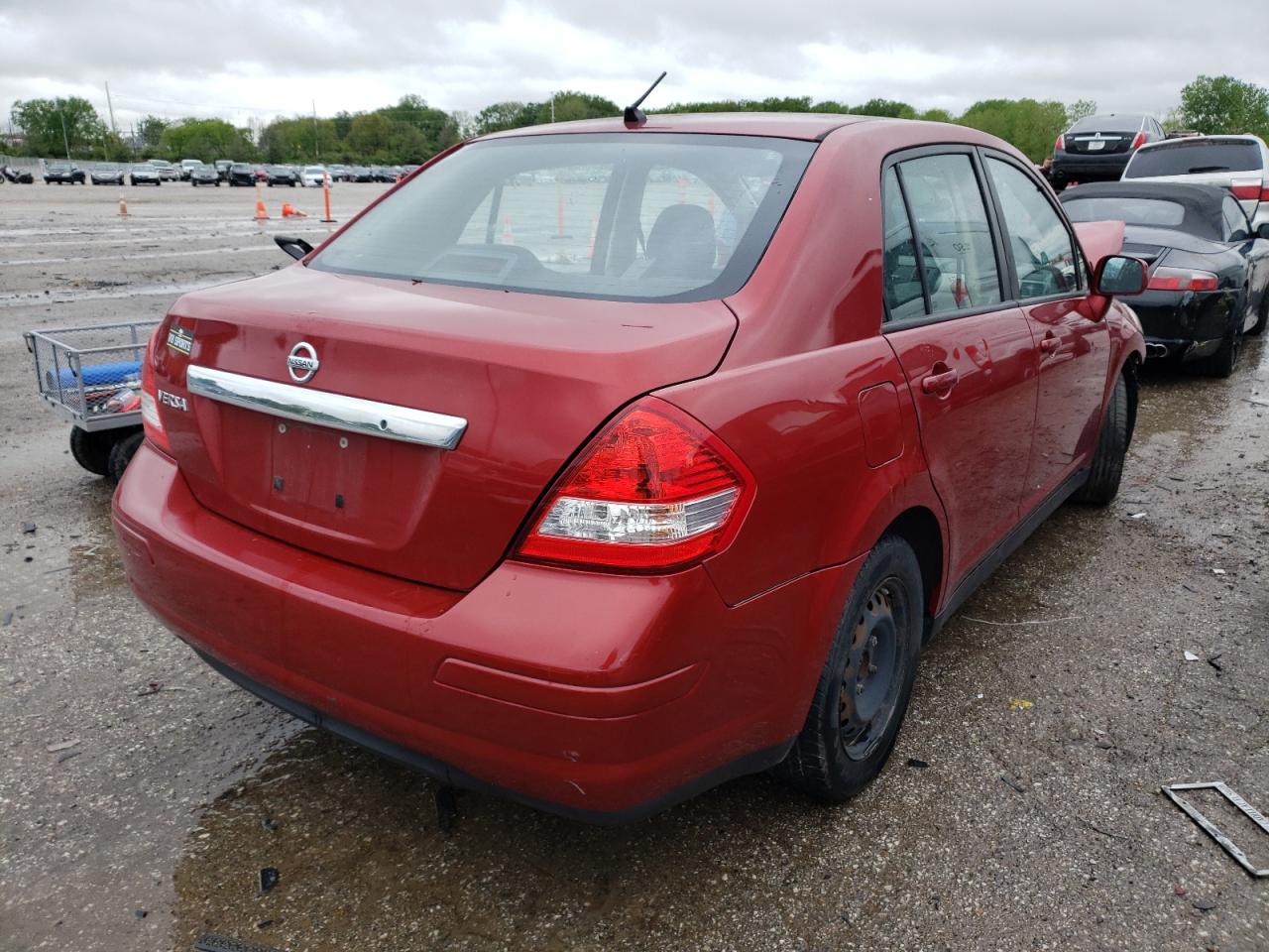 Photo 4 from auction – 2011 NISSAN VERSA S with VIN 3N1BC1AP7BL454496