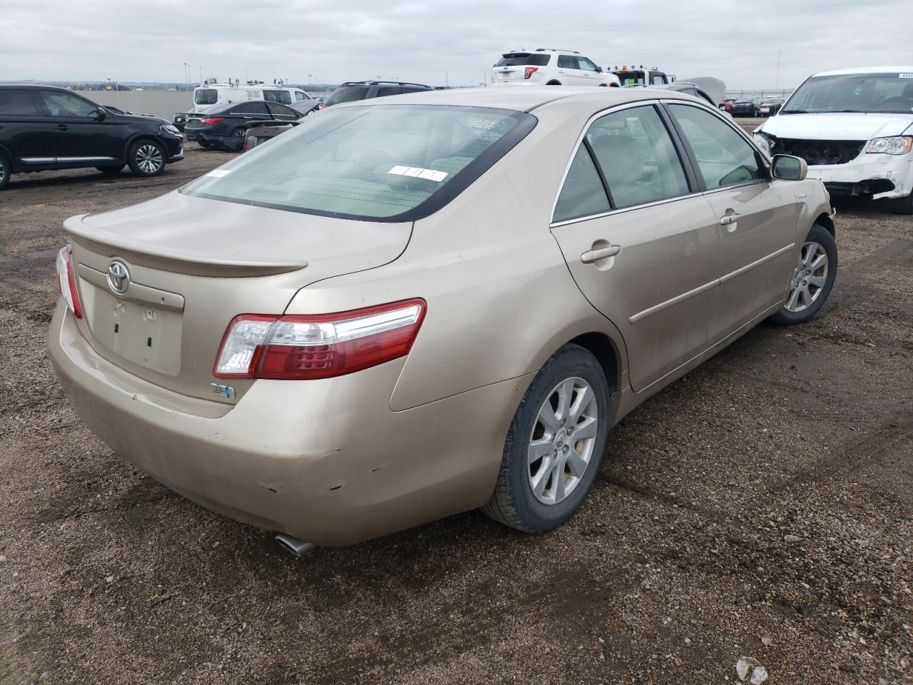 Photo 4 from auction – 2007 TOYOTA CAMRY HYBR with VIN JTNBB46K273042967