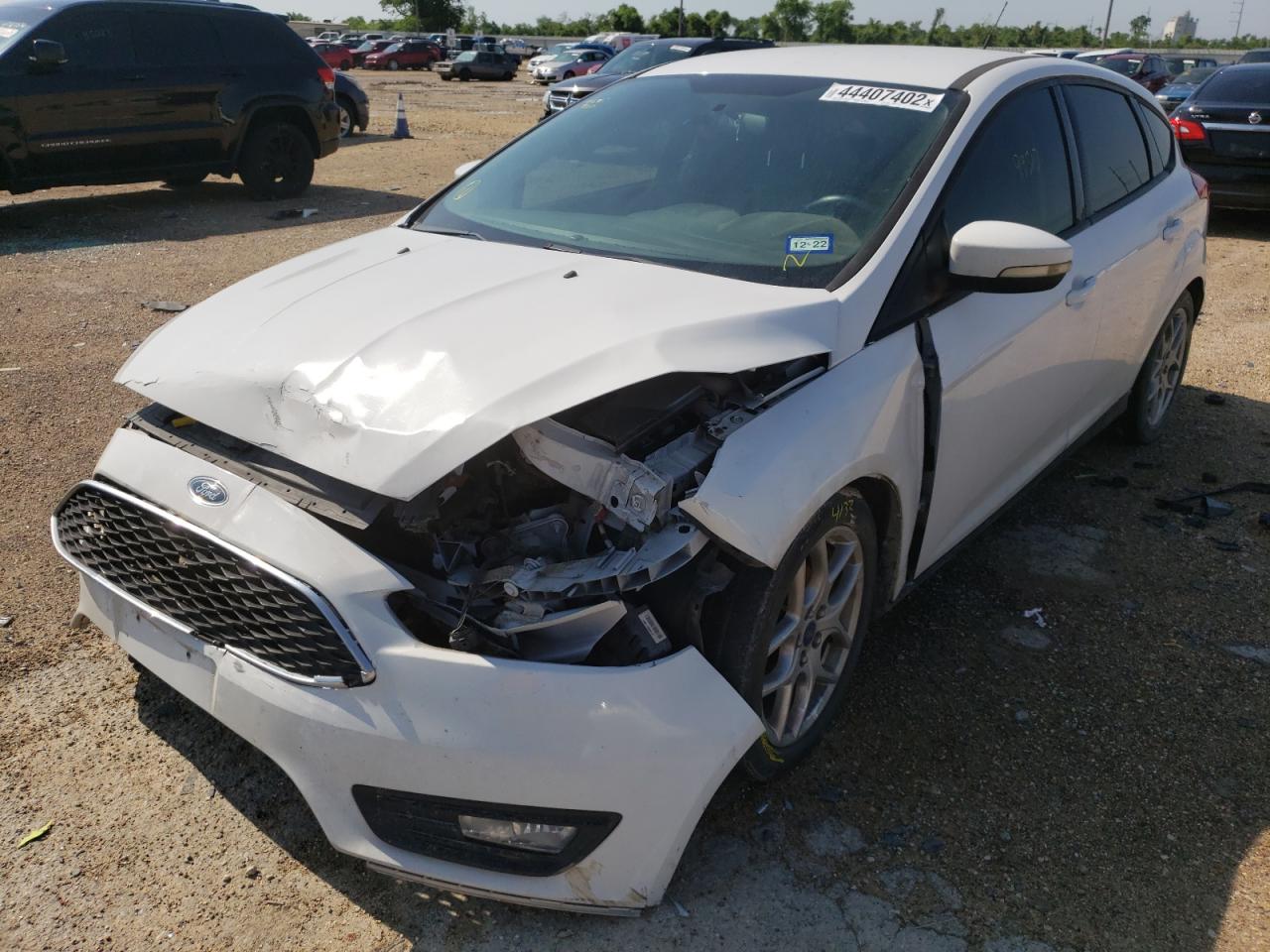 Photo 2 from auction – 2015 FORD FOCUS SE with VIN 1FADP3K23FL356923