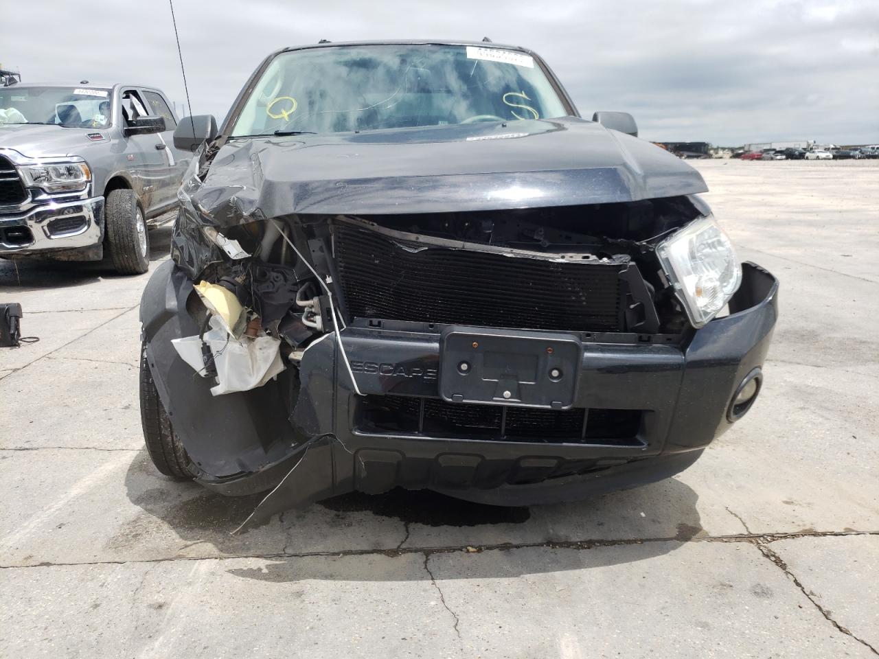 Photo 9 from auction – 2011 FORD ESCAPE XLT with VIN 1FMCU9D72BKC47651