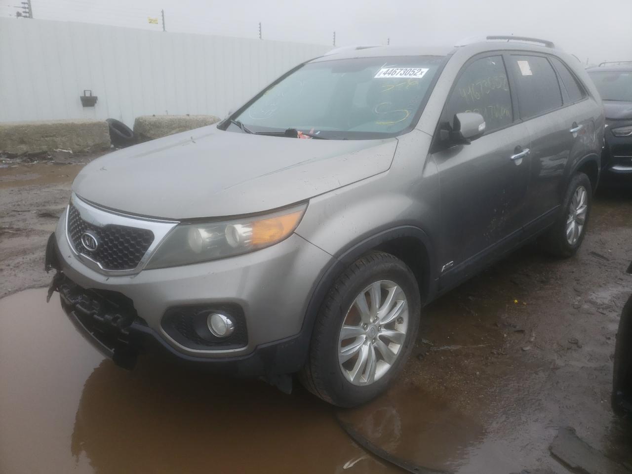 Photo 2 from auction – 2011 KIA SORENTO EX with VIN 5XYKUDA20BG061785